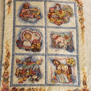 Colorful Patchwork Quilt with Animal and Toy Designs